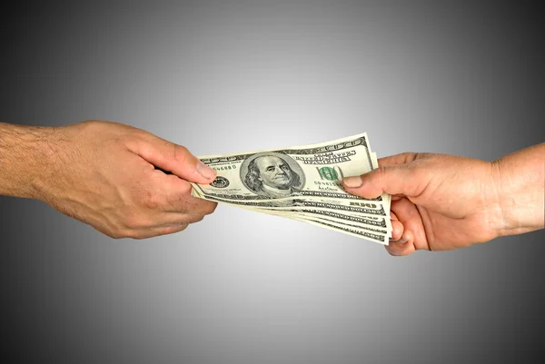 stock image Hands of man and woman with dollars