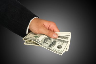 Hand with dollar bills clipart