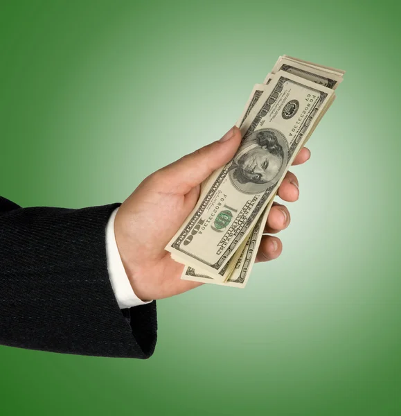 stock image Hand with dollar bills isolated on background