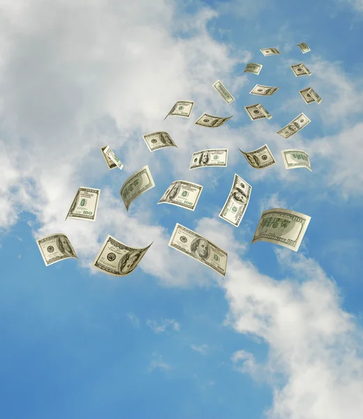 Доллары падают с неба — стоковое фото