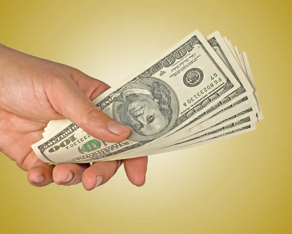 Hand with dollar bills — Stock Photo, Image