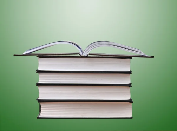 Boeken op groen — Stockfoto
