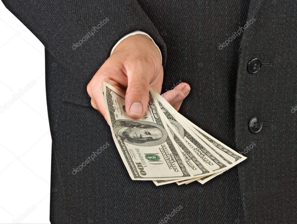Hand with dollar bills isolated on background