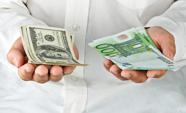 stock image Man with euro and dollars