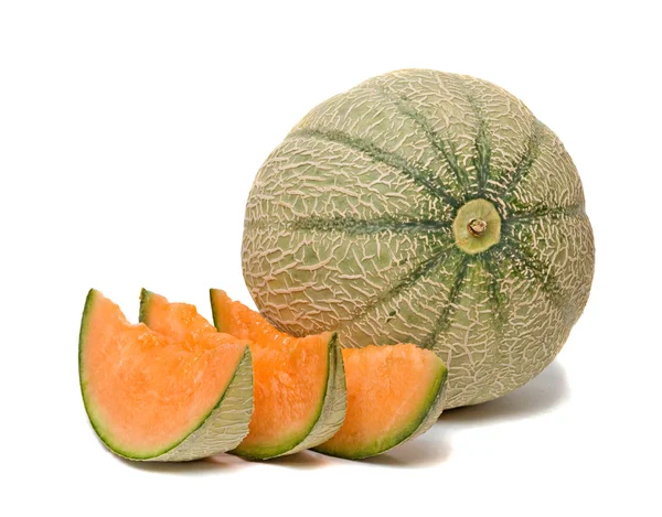 Melon et trois segments isolés sur fond blanc — Photo