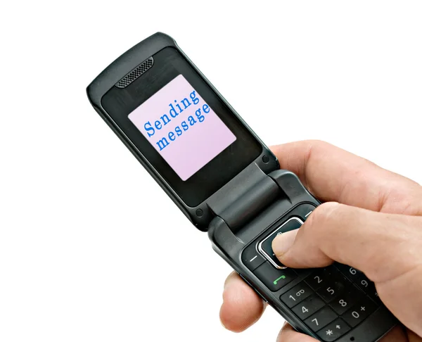 Telefon komórkowy z "wysyłanie" etykiety na ekranie — Zdjęcie stockowe