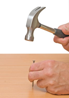 Claw hammer and hand with nail clipart