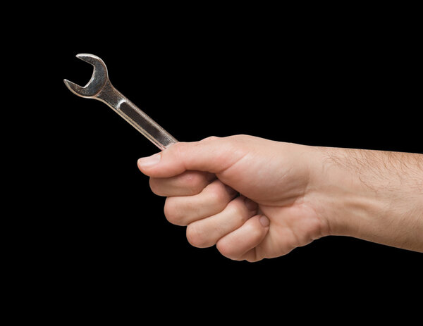 Open-ended wrench in hand