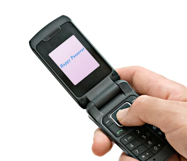 Мобильный телефон с счастливой Пасхой на экране — стоковое фото