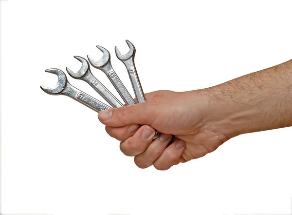 Open-ended wrenches in hand — Stock Photo, Image