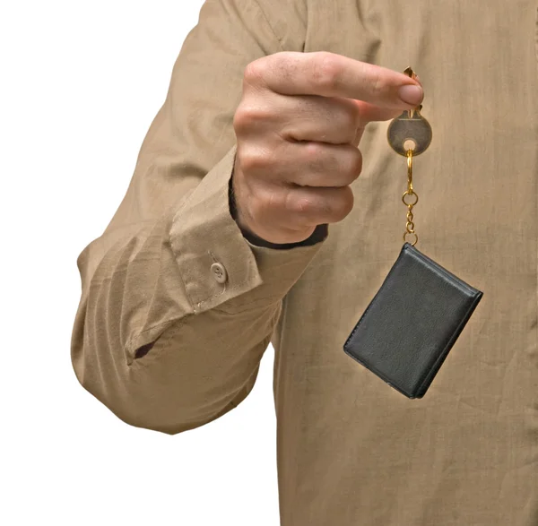 Close up of hand holding key isolated on background — Stock Photo, Image
