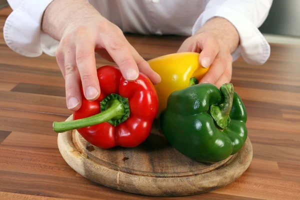 Stock image Chef and peppers