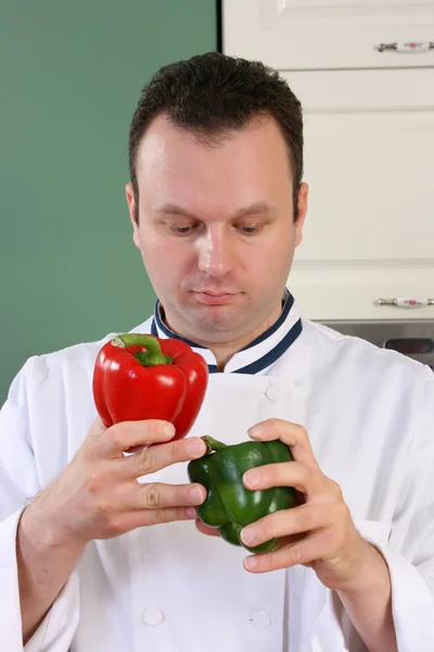Chef and peppers — Stock Photo, Image
