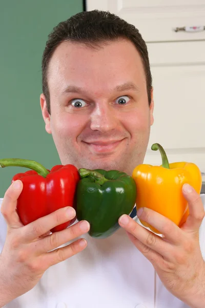 Chef-kok en paprika 's — Stockfoto