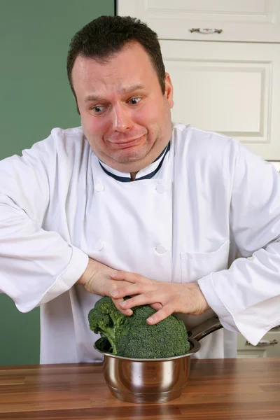 Chef-kok en broccoli — Stockfoto