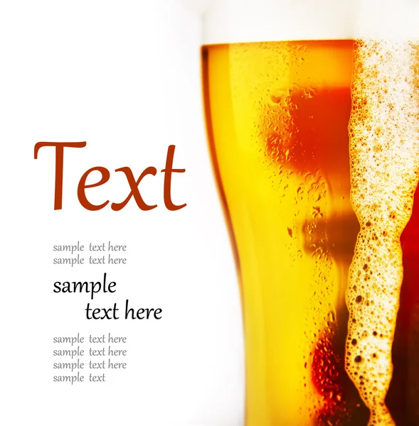 Cold glass of beer with foam — Stock Photo, Image