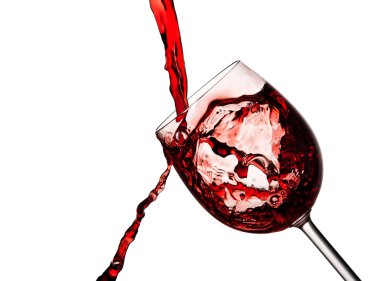 Red wine poured into crystal glass clipart