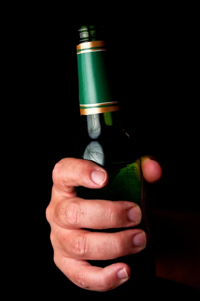 stock image Male hand holding beer bottle