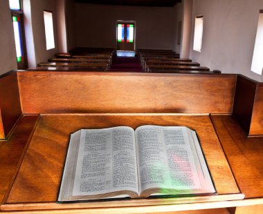 Empty church with lead glass doors clipart