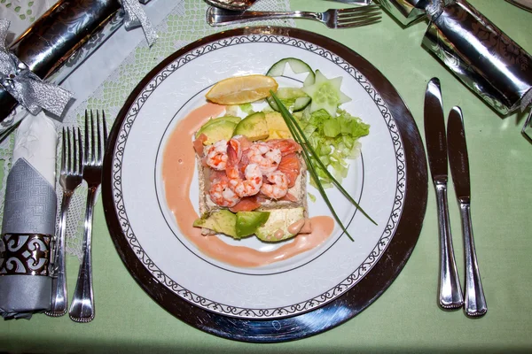 stock image Plate with seafood on a fancy set table