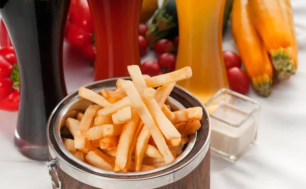 Fresh french fries on a bucket — Stock Photo, Image