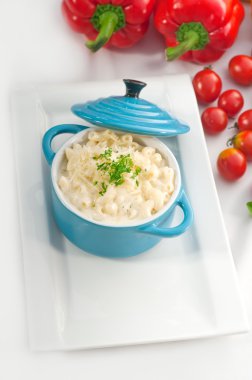 Mac and cheese on a blue little clay pot