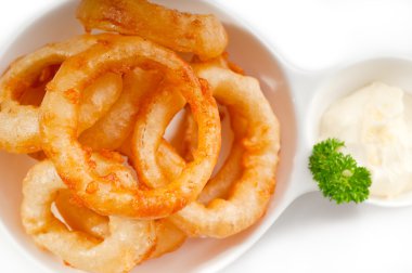 Golden deep fried onion rings clipart