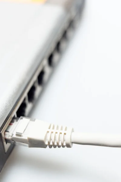 Network hub switch with lan cable connected — Stock Photo, Image