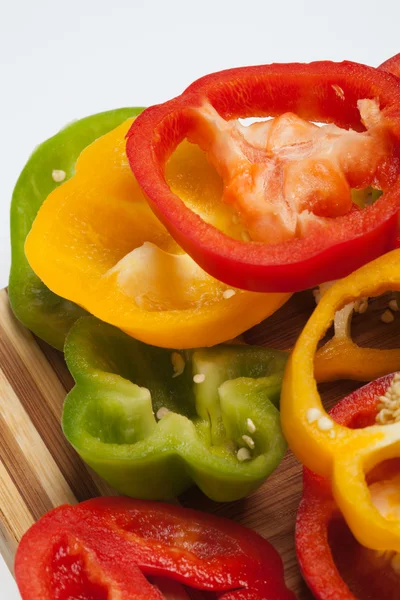 Close up of red, yellow and green peppers — Stock Photo, Image