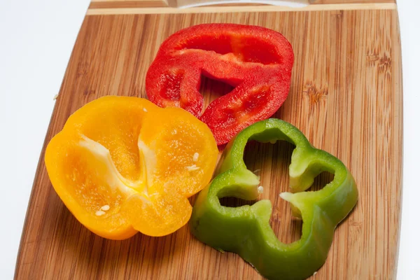 stock image Close up of red, yellow and green peppers