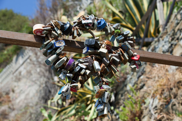 Lockers symbolizing love in Cinque Terre, Italy