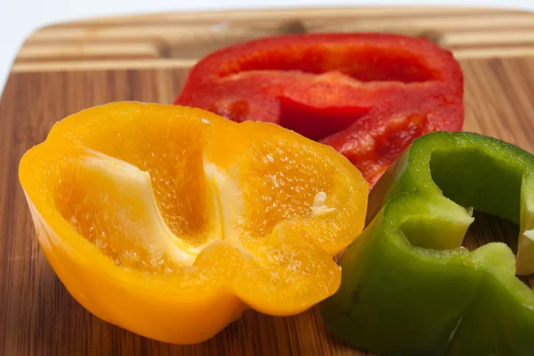 stock image Close up of red, yellow and green peppers