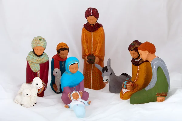 Figures representing nativity scene on white background — Stock Photo, Image