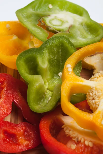 stock image Close up of red, yellow and green peppers