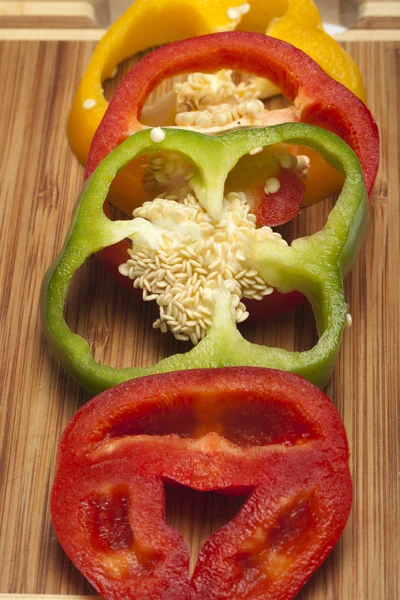 stock image Close up of red, yellow and green peppers