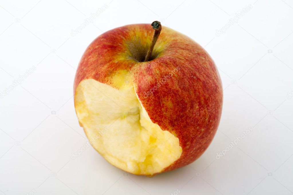 Bitten red apple on a white background