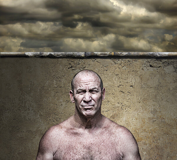 Tough Guy Against a Wall