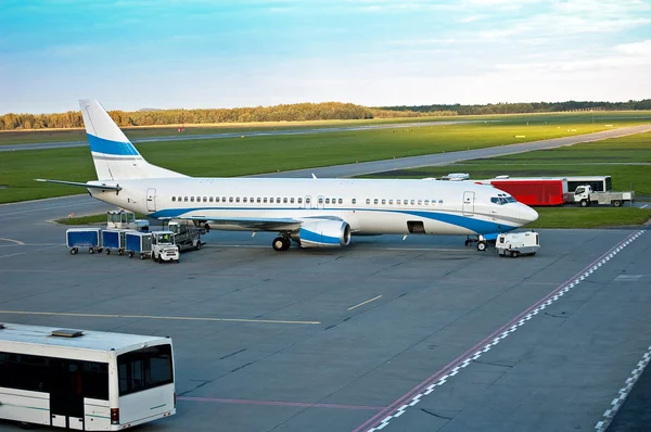 stock image Loading cargo on a plane