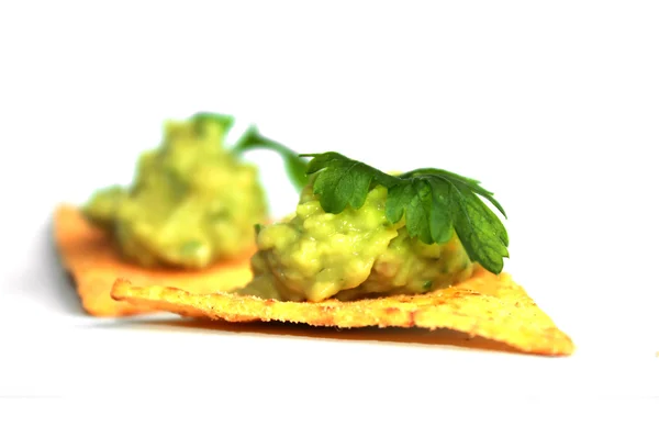 Tortilla chips with mexican guacamole - isolated on white — Stock Photo, Image