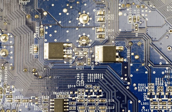 Technogenic background from a dark blue microprocessor panel