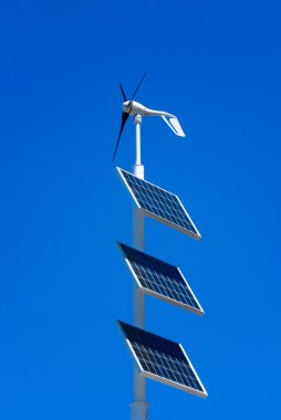 Wind generator and solar panels clipart