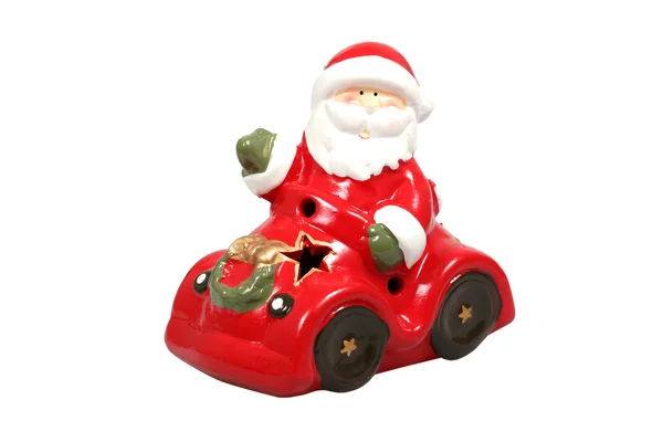 stock image Santa Claus in a car figurine