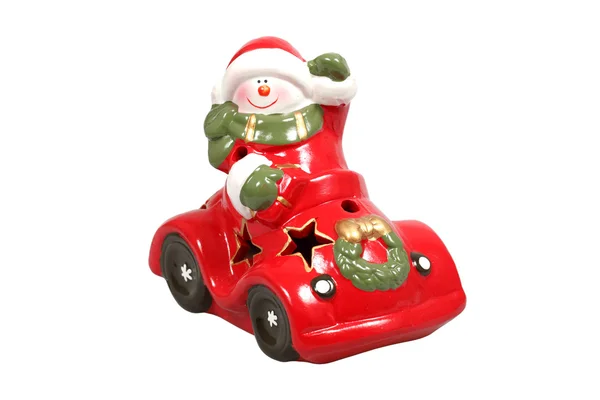 Stock image Snowman in a car figurine