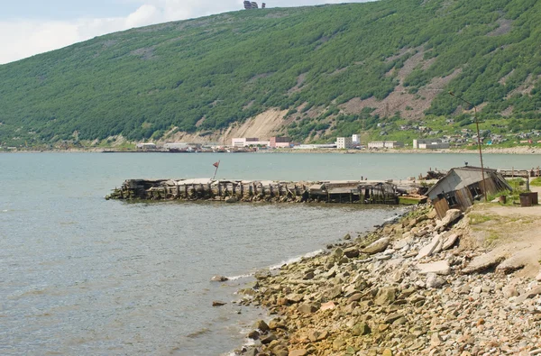 Oude pier in magadan Stockfoto