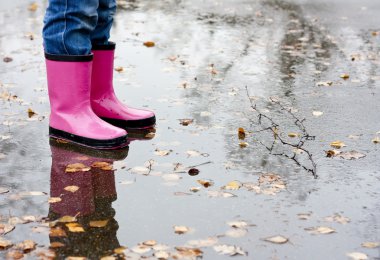 Boots in a puddle clipart