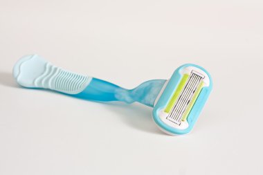 Blue razor isolate on white background. clipart