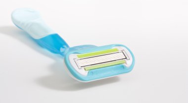 Blue razor isolate on white background. clipart