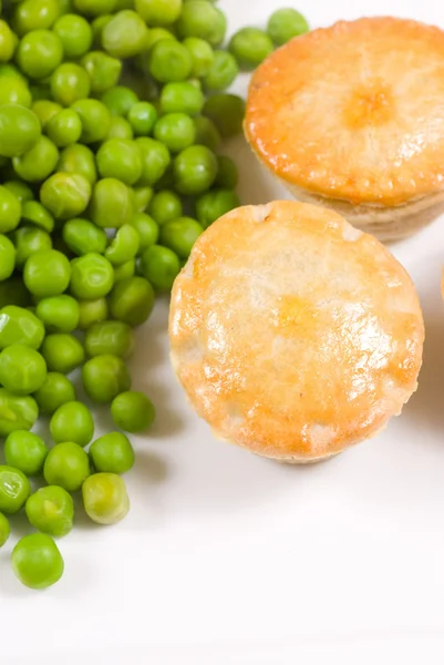 Pies and peas — Stock Photo, Image