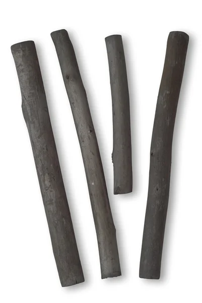 stock image Four Sticks of Charcoal on White