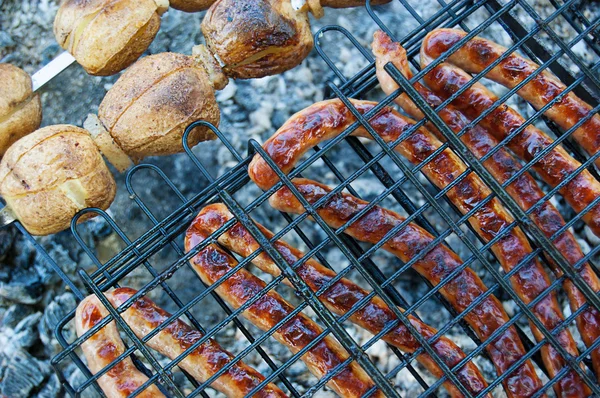 Sausages and potato barbecue — Stock Photo, Image